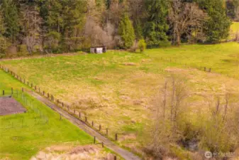 2 acre fully fenced pasture at lowest end of property. Both existing pastures run adjacent to the creek and have been used for livestock before.
