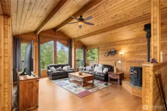 Warm, inviting cedar paneling throughout the upper level creates the ultimate wow factor in this unique, custom built  PNW Contemporary home!