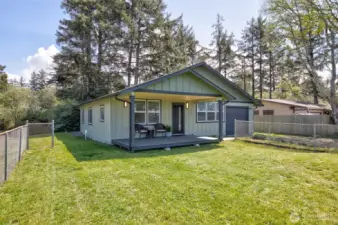 Enjoy relaxing on the covered front porch, with RV hookups and a fenced yard for added convenience.