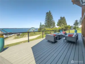 View from the 720 sq ft new deck with the 'Raincapture System' underneath. This system captures all the rain run off & can be used for irrigation, pressure washing, car washing etc. This also keeps the lower level dry which allows for all season use.