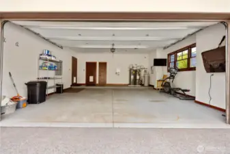 • Garage & Utility Ready  o Two-car attached garage with 220V outlet (EV-ready)  o Two hot water heaters  o Home electric system compatible with gas generator