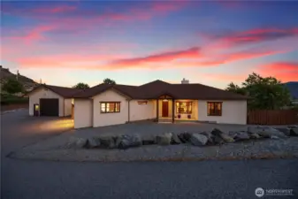 HOME INTERIOR  • Modern Comforts & Smart Living  o Soft-close drawers throughout  o Continuous hot water circulation and soft water system  o Instant hot water dispenser in kitchen  o Ceiling fans in every room  o French doors and plantation shutters add elegance  o Large dog doors leading to secure fenced exterior  • Chef's Kitchen  o Open-concept layout with generous counter space  o Walk-in pantry  o Dual-fuel (propane & electric) range and oven  o GE Kitchen Café appliances and built-in microwave  o Range hood and instant hot water system  • Well-Designed Spaces  o 3 spacious bedrooms with built-in closets (shelving & laundry system)  o Office with dual-sided fireplace shared with living room  o Media room, laundry room with additional refrigerator/freezer  o Master suite with reading nook bench   o Double sinks in both bathrooms and urinal in the primary bath.  • Garage & Utility Ready  o Two-car attached garage with 220V outlet (EV-ready)  o Two hot water heaters