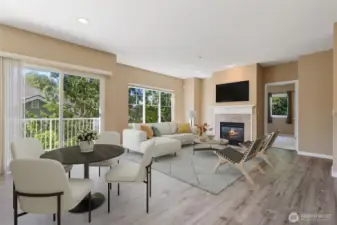 Virtually staged. Warm neutral tones complement any décor style. The cozy gas fireplace is perfect for relaxing evenings.