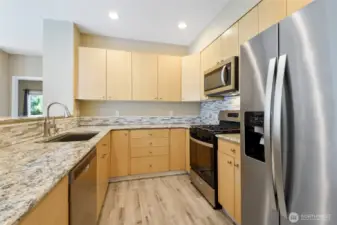 Fully remodeled kitchen with modern finishes.