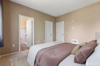 Virtually staged. Spacious primary suite with a private en-suite bath for convenience.