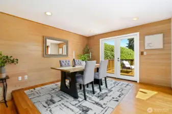 Formal dining room with French doors to the view deck.