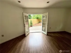 family room opens to a private yard