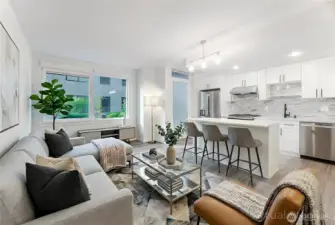 This beautifully presented property features a spacious and inviting living room, complemented by a modern and updated kitchen. (virtually staged).