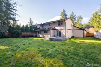 Large fully fenced back-yard with composite deck & low maintenance landscaping