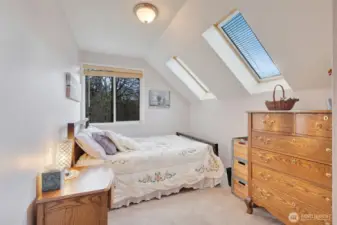 Cozy 2nd Floor Bedroom with Skylights Brings Nature In!!
