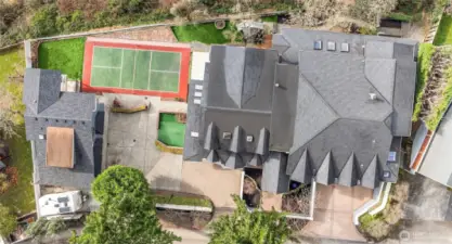 Experience a truly extraordinary, fully gated custom estate set on a rare 20,237-square-foot lot with sweeping views of the Salmon Bay Waterway, Puget Sound, and the Olympic Mountains. This is Pacific Northwest living at its finest.