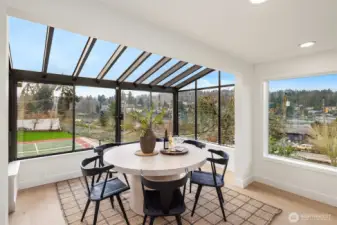 Tucked just off the kitchen, a sun-filled breakfast nook provides a serene setting for slow mornings and informal dining.