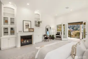 A true retreat, the primary suite offers a gas/wood-burning fireplace, private balcony, oversized walk-in closet, and a stunning spa-inspired bath.