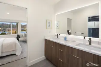 Upstairs, a well-appointed Jack-and-Jill bath connects two of the secondary bedrooms.