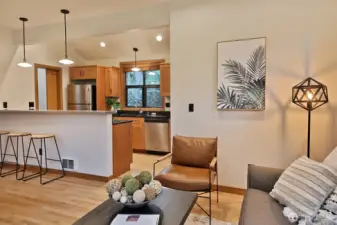Kitchen counter allows conversation while cooking.