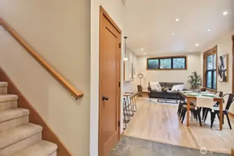 Stairway to the upper level primary suite.