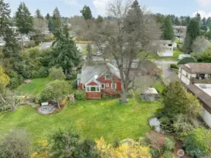 Welcome to this secret garden secluded refuge with 0.6 acre that's only a couple blocks from the heart of the downtown Des Moines Marina District, the new Des Moines Theater, upcoming Marina Steps park (projected completion for Dec 2026) and lots of great cafes, restaurants and shops along the Marine View Dr strip.