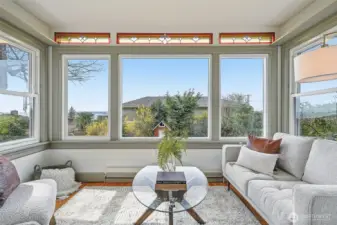 The sunroom has the best views in the house from the main floor, and natural light pours in.