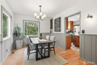 Dining room off front door entry and living room flows into the kitchen and back into the living room, the ideal circular floor plan layout.