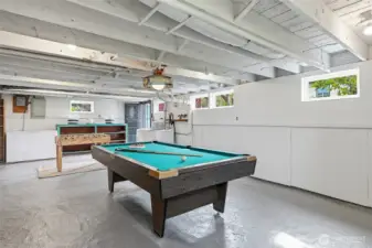 Basement has great ceiling height (additional finished sq footage potential) and the pool table / ping pong table, chest freezer and additional fridge (not pictured) is included in the sale. Not pictured is also an enormous storage shelving area in the basement.