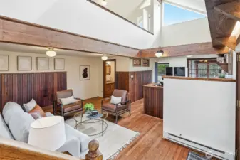 Open floor plan layout with a 3/4 bath, kitchen, living room and back room office / pantry on the main level -- top floor is the loft bedroom with attached 1/2 bath.