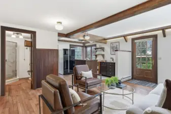 Open floor plan layout with a 3/4 bath, kitchen, living room and back room office / pantry on the main level -- top floor is the loft bedroom with attached 1/2 bath.