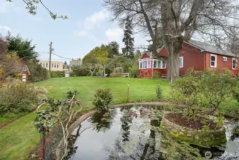 HUGE lawn with sprinkler system. Building potential for this lot as well to build additional units or detached garage or both! Tons of lot sq footage to work with.