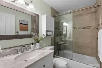 The second bathroom is just as delightful with the option to soak in a bubble bath after a long day of work!