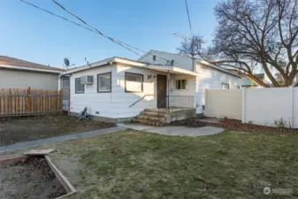 Large, fenced rear yard and rear covered patio