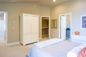 Primary bedroom with en-suite bathroom and large closet