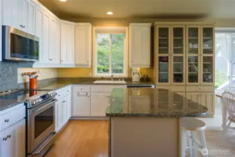 Beautifully, well thought-out kitchen with granite counter tops and stainless steel appliances