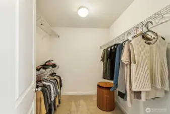 This large walk -in closet is one of two closets in the primary suite.