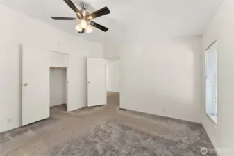 Primary suite with walk-in closet.