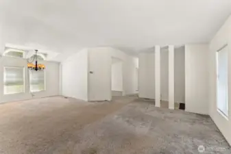 Livingroom facing dining room, den, and hallway to bedrooms 2 and 3 and main bathroom.