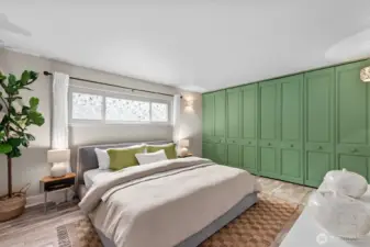 Over-sized Primary Bedroom with ample space for Bed plus furnishings.  Huge Double Closet with organizers.