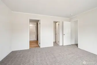 The primary bedroom has an attached 3/4 bathroom.