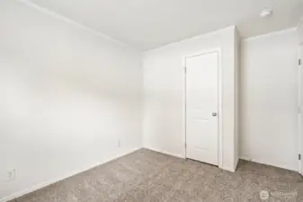 2nd bedroom with a closet.