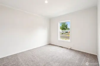 3rd bedroom looking out to the front yard.