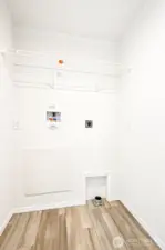Laundry room is next to the back door.