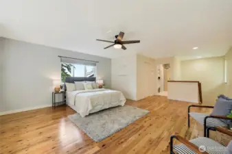 Upstairs bedroom w/ peak-a-boo water & mountain views.