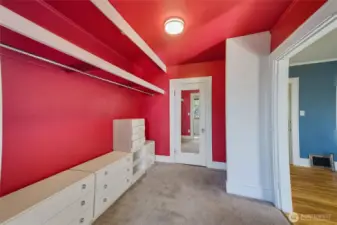Unit A main bedroom closet (more closet behind mirrored door!) and leads to enclosed bay view balcony