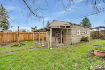 A large, detached garage adds value and versatility.