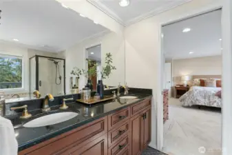 Granite and cherry upgrade this space, and there is room to share with twin sinks.