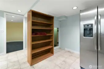 There is a secret room here, behind the bookcase! Also, more storage!