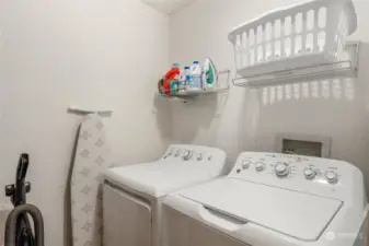 Generous, separate laundry room.
