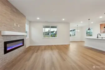 Looking across Great room through kitchen at dining.