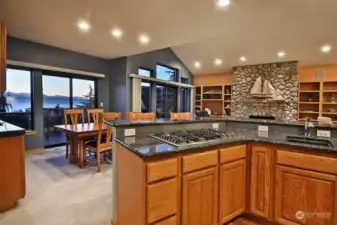 Propane cooktop and second sink in your center island. Pull up a stool and hang with the chef or enjoy your meal here.