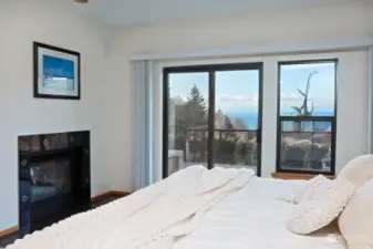 Glass doors lead to the view deck. Wake to your mountain and sound views!