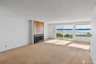 Large living room with gas fireplace.
