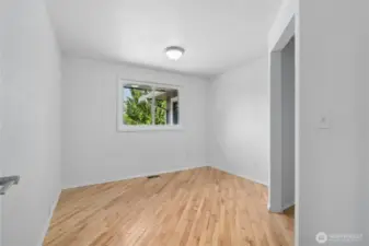 Bedroom #3 with wood flooring.